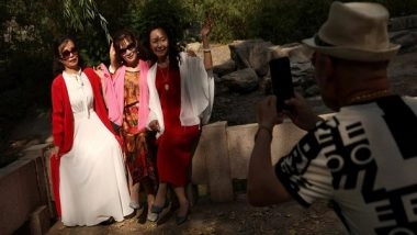 World News | China's Slowdown Dampens Holiday Spending, Plunges to Lowest Level in 7-year