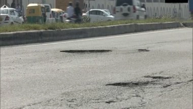 India News | Commuters Request Govt to Repair Potholes on Delhi-Jaipur Highway Near Gurugram