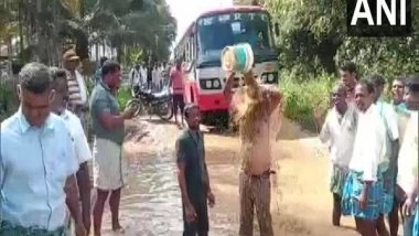 India News | Karnataka: Locals in Tumkur Take Bath in Slush Protesting over Bad Roads