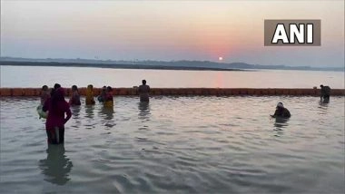 India News | Prayagraj: Devotees Take Holy Dip in Sangam in View of Partial Solar Eclipse