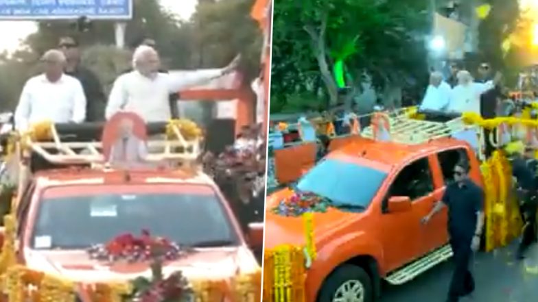 Video: People Shower Flower Petals on PM Narendra Modi And CM Bhupendra Patel as They Hold Roadshow in Gujarat's Rajkot