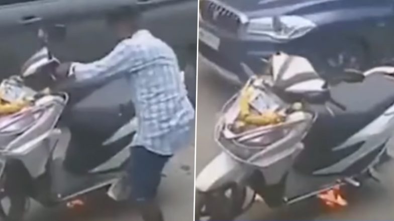 Video: People Rush to Couple's Rescue After Their Scooter Catches Fire