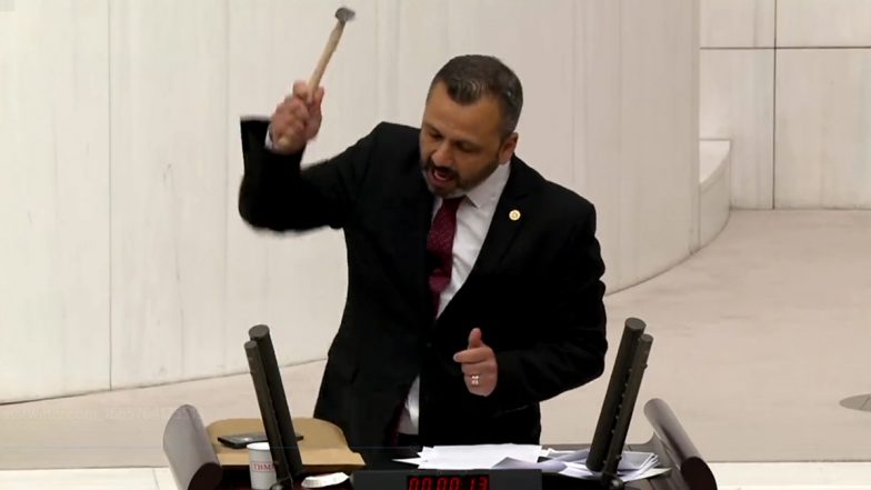 Video: Turkish Lawmaker Burak Erbay Smashes Phone with Hammer During Speech in Parliament to Protest Against Disinformation and Social Media Bill