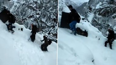 Himachal Pradesh Assembly Elections 2022: Polling Officials Walk 15 Kms in Snow to Reach Chasak Batori Polling Station in Bharmaur at 12,000 Feet (Watch Video)