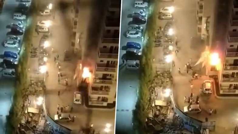 UP Fire: Massive Blaze Erupts at Flat on First Floor in Residential Building of Rajnagar Extension (Watch Video)