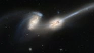 Hubble Captures Unusual Galaxy Merger in Ancient Universe
