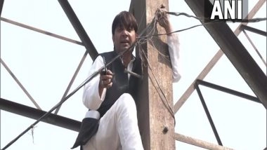 India News | AAP's Ex-councillor Climbs a Transmission Tower After Being Denied Ticket for MCD Polls