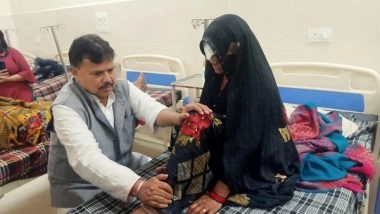 India News | MP Minister Serves Elderly Patient by Pressing Her Feet in Gwalior