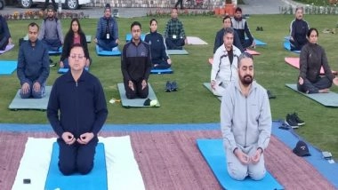 India News | Uttarakhand CM Performs Yoga with Administrative Officials at Chintan Shivir