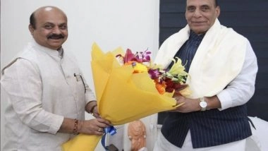 India News | Bommai Meets Rajnath Singh Urging Him to Handover State's Land Under 'defence Control'