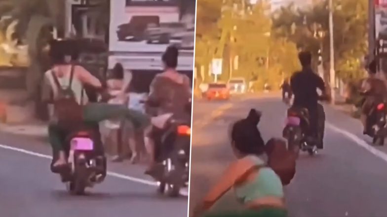 Viral Video: Woman Loses Balance And Falls Off Scooty While Trying to Kick Rider