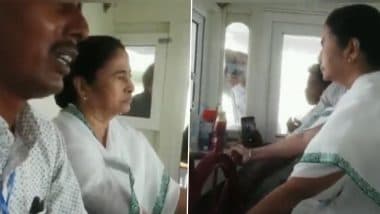 West Bengal CM Mamata Banerjee Drives Boat While Visiting Villages in North 24 Parganas (Watch Video)