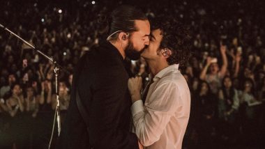 Matty Healy of The 1975 Kisses His Bandmate Ross MacDonald Onstage During Their LA Concert (Watch Video)