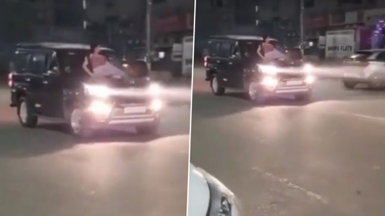 Viral Video: Woman Performs Stunt by Sitting on Moving Car's Bonnet in Noida, Police Seize Vehicle