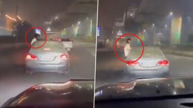 Video: Woman Performs Stunt Inside Moving Car in Noida; Police Assure Action After Act Caught on Camera