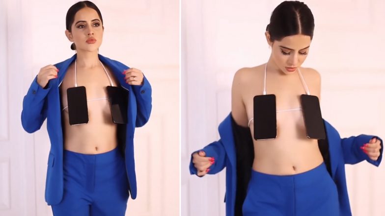 Urfi Javed Covers Her Bo**s With Phones As She Slays in a Braless Pantsuit (Watch Video)