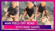 Man Peels Off Road With Bare Hands In Uttar Pradesh&rsquo;s Pilibhit; Road Built At A Cost Of Rs 3 Crores