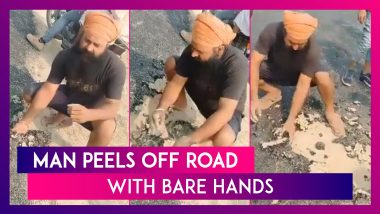 Man Peels Off Road With Bare Hands In Uttar Pradesh’s Pilibhit; Road Built At A Cost Of Rs 3 Crores