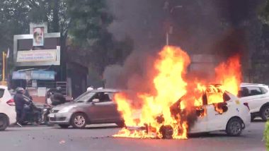 Delhi: Car Catches Fire at Busy ITO Intersection, No Casualty Reported (See Pics)
