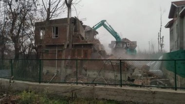 India News | JeM Terrorist's House on Encroached Land Demolished in J-K's Pulwama