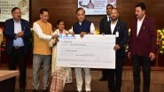 Business News | Assam CM Hands over Rs 10,000 Each to Covid-hit Purohits, Namghoriyas