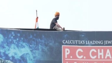 India News | Odisha: Man Climbs Hoarding, Threatens Suicide; Rescued by Fire Service, Bhubaneswar Police