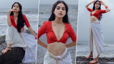 Anaswara Rajan Poses Seductively in Red Blouse With Plunging Neckline and White Dhoti; Super Sharanya Actress Oozes Sexiness in Her Latest Photoshoot (View Pics)