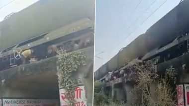 Viral Video: Thieves Steal Oil From Moving Goods Train in Bihar