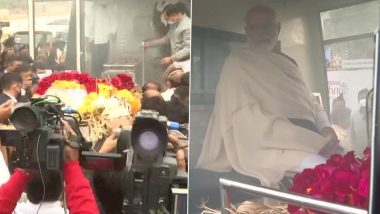 Looking on: PM Modi, his brothers perform last rites of their mother, Watch