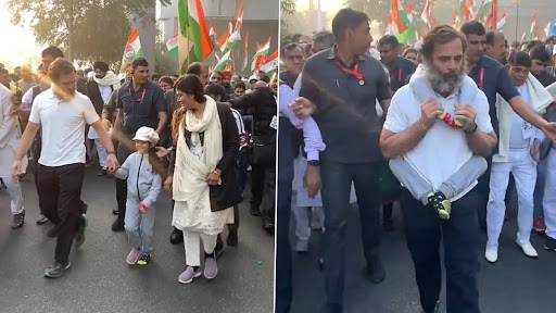 Rahul Gandhi Carries a Kid on His Shoulder and Walks During Bharat Jodo Yatra in Delhi (Watch Video)