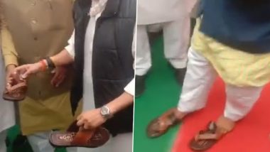Jyotiraditya Scindia Places Slippers for Madhya Pradesh Minister Pradyuman Singh, Who Was Barefoot for 66 Days (Watch Video)