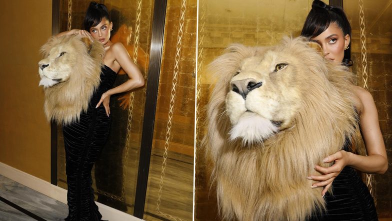 Kylie Jenner Accessorizes With a Giant Faux Lion Head for Paris