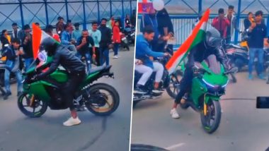 Tiranga on Back, Youth Performs Bike Stunt on Busy Road in Uttar Pradesh's Kanpur (Watch Video)