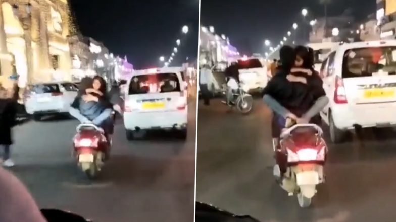 Uttar Pradesh: Lucknow Couple's Indecent Stunts On Moving Two-Wheeler on Busy Road Goes Viral, Probe Launched (Watch Video)