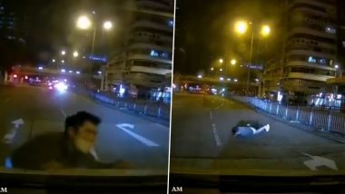 Fake Accident! Scammer Pretends He Was Hit By Car in Over-The-Top Performance on the Road For Ages; Watch Viral Video