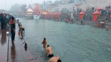 India News | Uttarakhand: Devotees Throng Temples and Take Holy Dip in Ganga on New Year