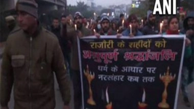 India News | J-K: Kashmiri Pandits Hold Candle March Against Rajouri Killings