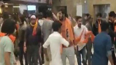 India News | Gujarat: Bajrang Dal Protests Against Film 'Pathaan,' Tear Down Shah Rukh Khan's Posters
