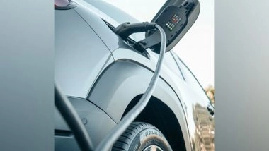 Business News | US Electric Vehicle Sales Surge in 2022, Broader Auto Market Contracts