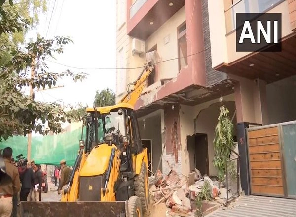India News | Rajasthan Paper Leak Case: JDA Removes Illegal Portions of Accused Bhupendra Saran's House