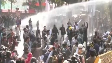 India News | Delhi Police Use Water Cannons Against AAP Workers Protesting Slum Demolition