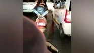 PDA on Two-Wheeler: Viral Video Shows Duo Hugging While Riding Scooty in Lucknow's Hazratganj, Probe Underway