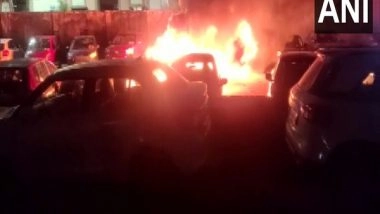 India News | Telangana: Electric Vehicle Catches Fire in Hyderabad's Parking Lot; 3 Cars Gutted to Fire, Other 3 Partially Burned