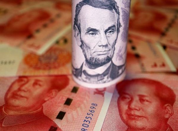 World News | US Dollar Gains Strength as Chinese Yuan Depreciates Amid Its Shrinking Economy