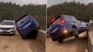 Two SUV Cars Cross Each Other on Narrow Bridge After Drivers Refuse To Back Away, Video Goes Viral