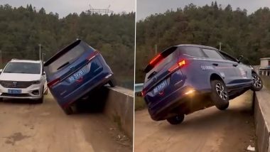 Two SUV Cars Cross Each Other on Narrow Bridge After Drivers Refuse To Back Away, Video Goes Viral