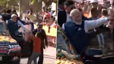 PM Narendra Modi Security Lapse: Man Breaches Security Cover During Prime Minister's Roadshow in Hubballi, Runs to Him With Garland (Watch Video)