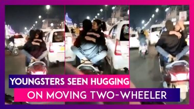 Viral Video: Youngsters Seen Hugging On Moving Two-Wheeler In Lucknow’s Hazratganj, Probe Underway By UP Police