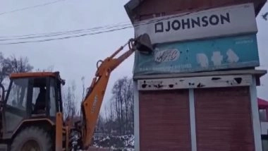 India News | J-K: Anantnag District Admin Razes Illegal Shopping Complex of Jailed Hurriyat Leader Qazi Yasir