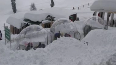 India News | J-K: Tourists Flock to 'Glass Igloo' in Middle of Snow in Gulmarg